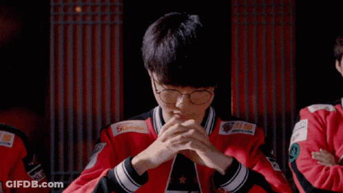 Young Men Sitting At Table With Man In T1 Shirt GIF