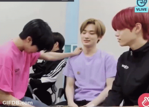 Young Men Sitting At Table GIF