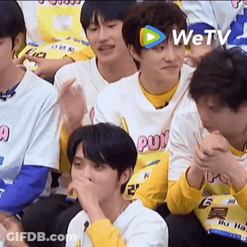 Young Men Sitting In Room GIF