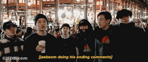 Young Men Standing In Front Of Crowd GIF