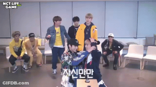 Young Men Standing In Room With NCT Life Game GIF