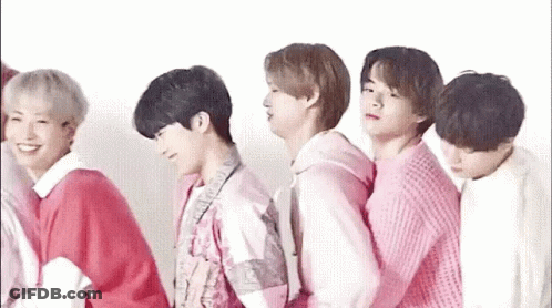 Young Men Standing In Row GIF