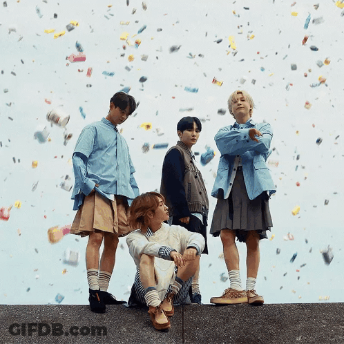 Young Men Standing On Wall With Confetti GIF
