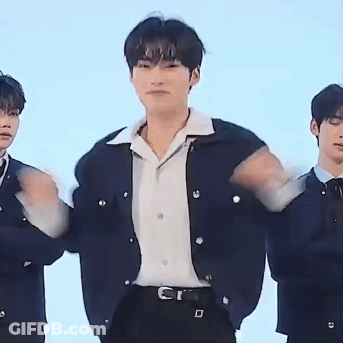 Young Men Standing Together GIF