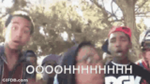 Young Men Standing Together One Wearing DGK Shirt GIF