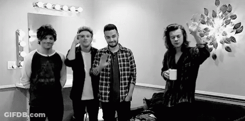 Young Men Standing Together GIF