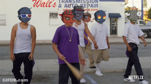 Young Men Walking In Front Of Walt's Transmission & Auto Repair Store GIF
