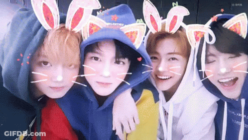 Young Men Wearing Bunny Ears GIF
