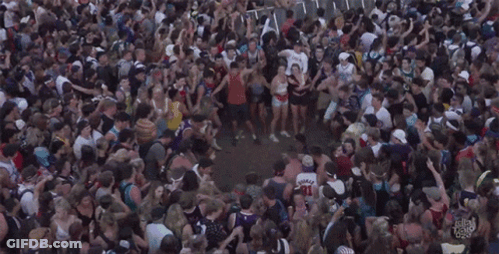 Young People Crowd Having Fun In Mosh Pit GIF