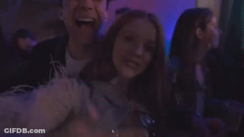 Young People Dancing In Dark Room GIF
