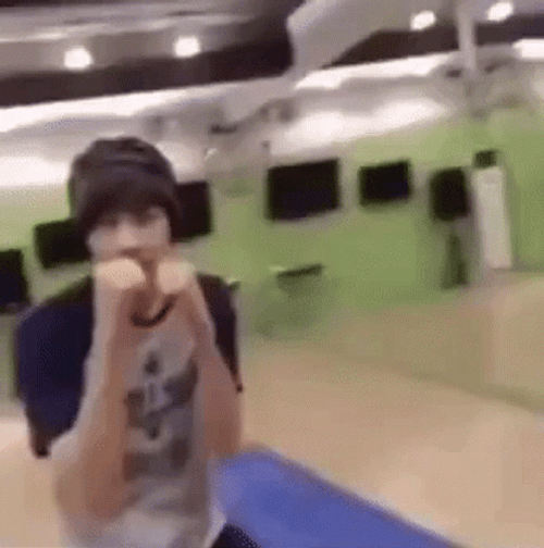 Young Seventeen Wonwoo Punching Air GIF