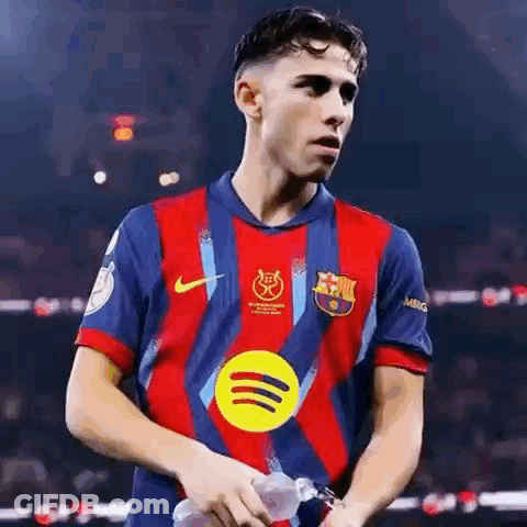 Young Soccer Player Holding Water Bottle GIF