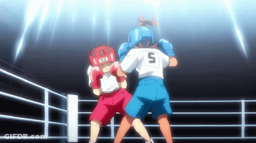 Young Woman In Boxing Gloves In Boxing Ring GIF