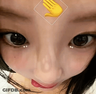 Young Woman In Suit And Tie Sitting At Table GIF