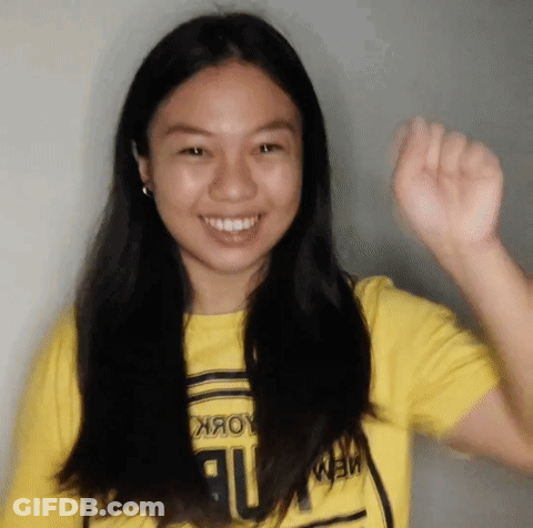Young Woman In Yellow Shirt Saying New York GIF
