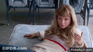 Young Woman Laying On Mattress GIF