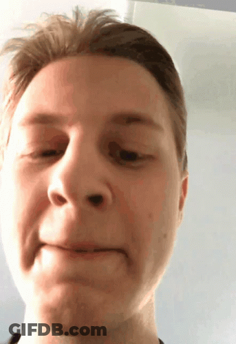 Young Woman Making Funny Face In Front Of TLC Logo GIF