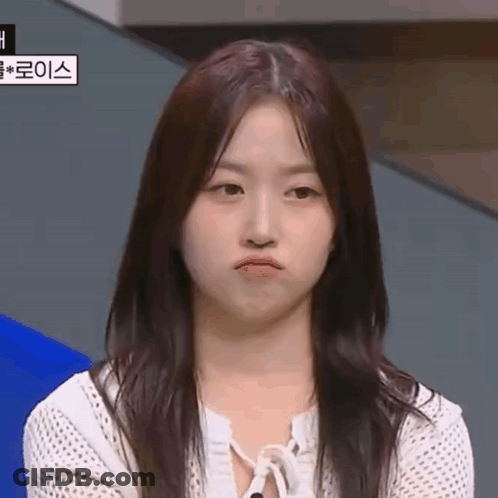 Young Woman Making Funny Face With Mouth Open GIF