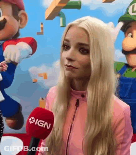 Young Woman Singing Into Microphone GIF