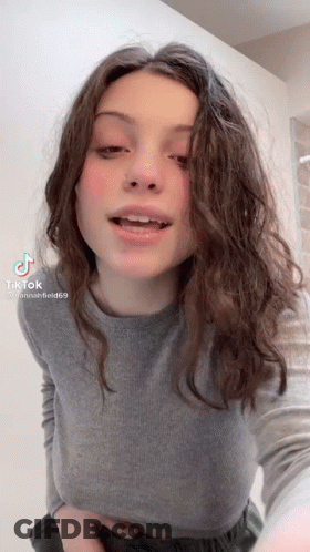 Young Woman Taking Selfie With Mouth Open GIF