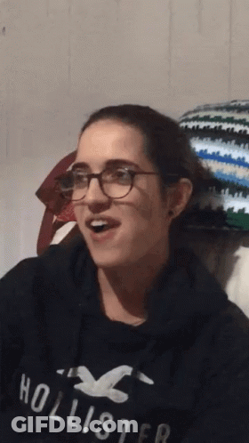 Young Woman Wearing Glasses And Hollister Sweatshirt GIF