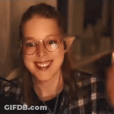 Young Woman With Glasses And Nose Ring Smiling GIF