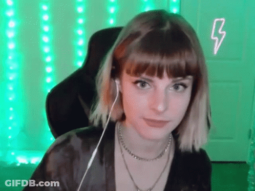Young Woman With Headphones In Front Of Green Lightning Bolt GIF