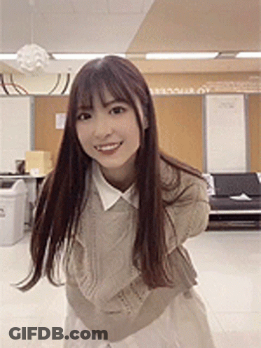 Young Woman With Long Hair Arms Behind Back GIF