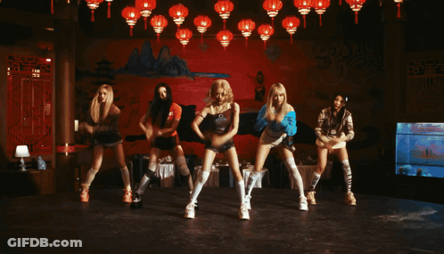Young Women Dancing In Front Of Mamihlapitapai Building GIF