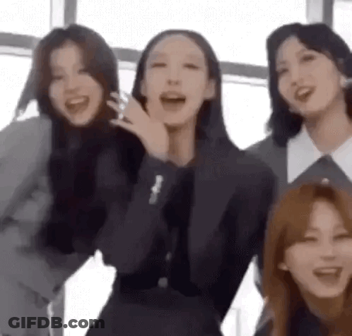 Young Women Posing And Laughing Together GIF