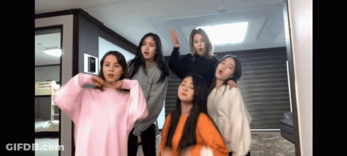 Young Women Posing In Living Room GIF