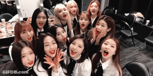 Young Women Posing With Mouths Open GIF