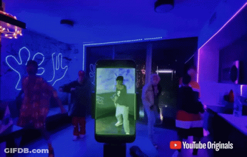 YouTube Music Ad People Dancing Blue Lights GIF