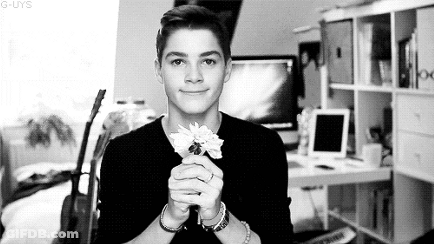 YouTuber Jack Harries Giving Flowers GIF