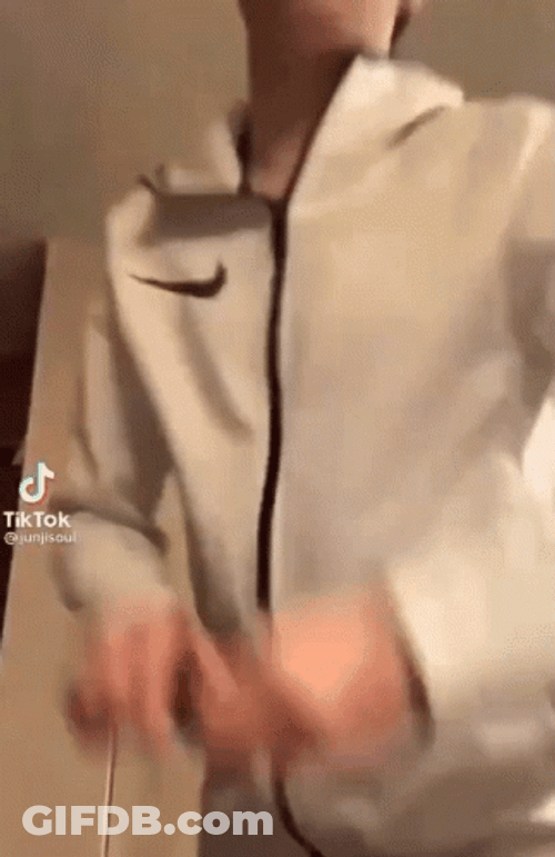 Youtuber Tapping Then Handing Credit Card GIF