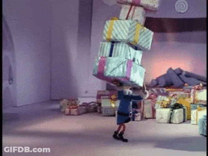 Yukon Cornelius Head Elf Preparing Gift GIF