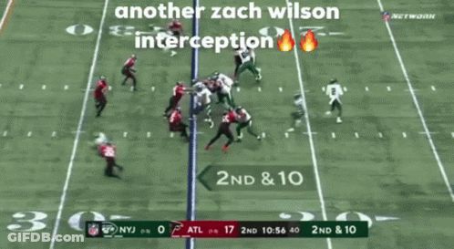 Zach Wilson Interception On Football Field GIF