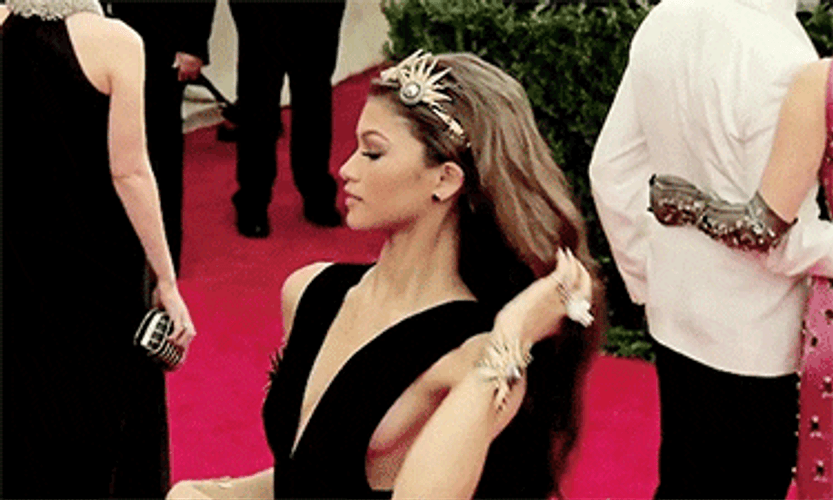 Zendaya Flipping Hair GIF