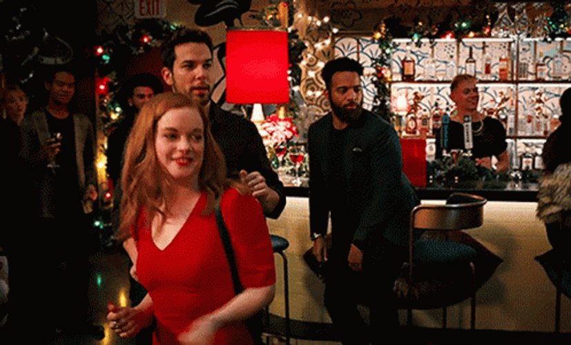 Zoey Clarke Max Richman Attending Christmas Party GIF