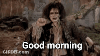 Zombie Saying Good Morning Sitting On Rock GIF