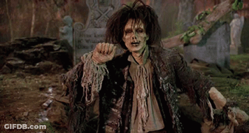 Zombie Standing In Front Of Grave GIF