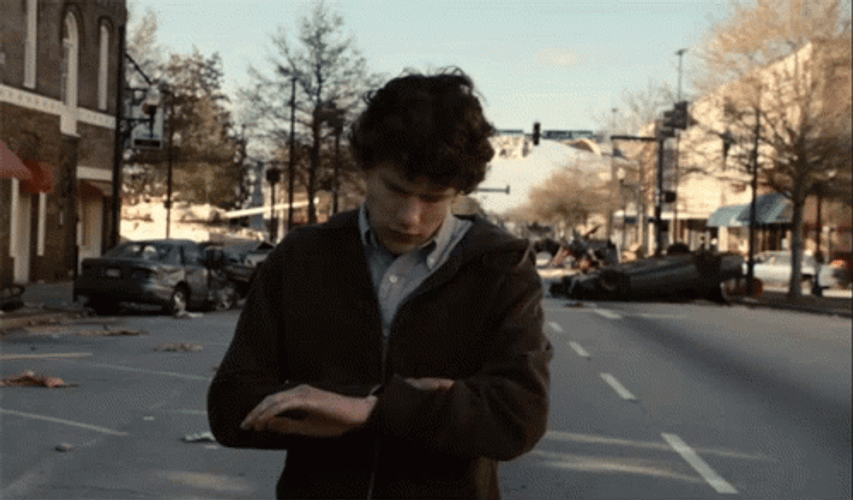 Zombieland Worried Jesse Eisenberg Check Watch GIF