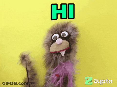 Zypto Logo On Yellow Background Next To Puppet GIF