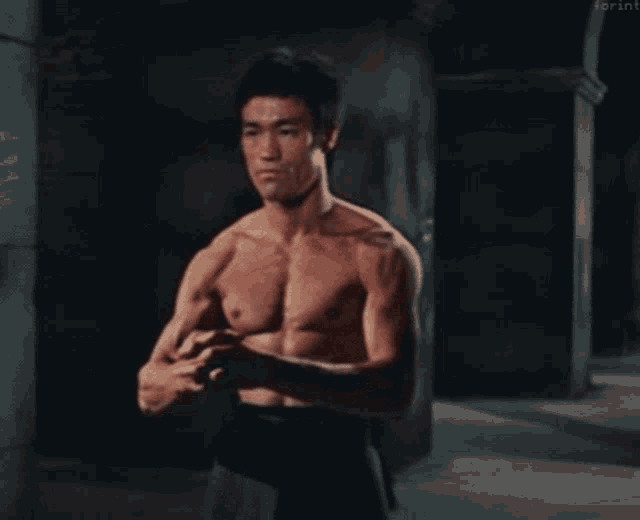 Bruce Lee Muscles On GIF 