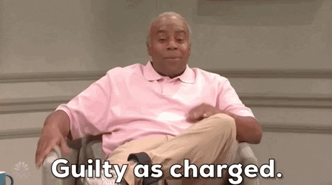 A GIF of Kenan Thompson from a comedy sketch looking shocked and guilty with exaggerated facial expressions.