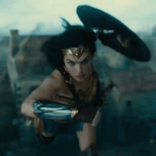 Gal Gadot transforming into Wonder Woman, ready for action