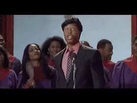 A character from 'Don't Be a Menace' making a 'preach' gesture with intense conviction, delivering a comedic yet impactful statement.