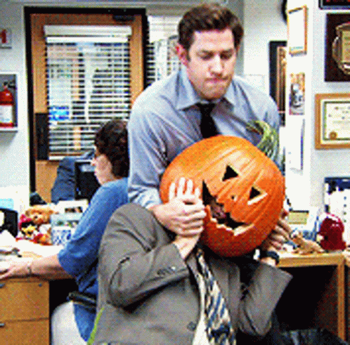 Dwight Gets His Head Stuck In A Pumpkin GIF