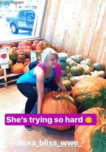 Woman Try To Carry Big Heavy Pumpkin GIF