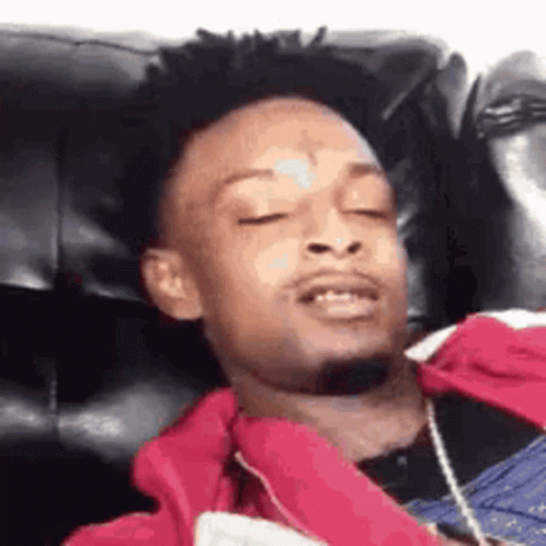 21 Savage Lying On Couch GIF
